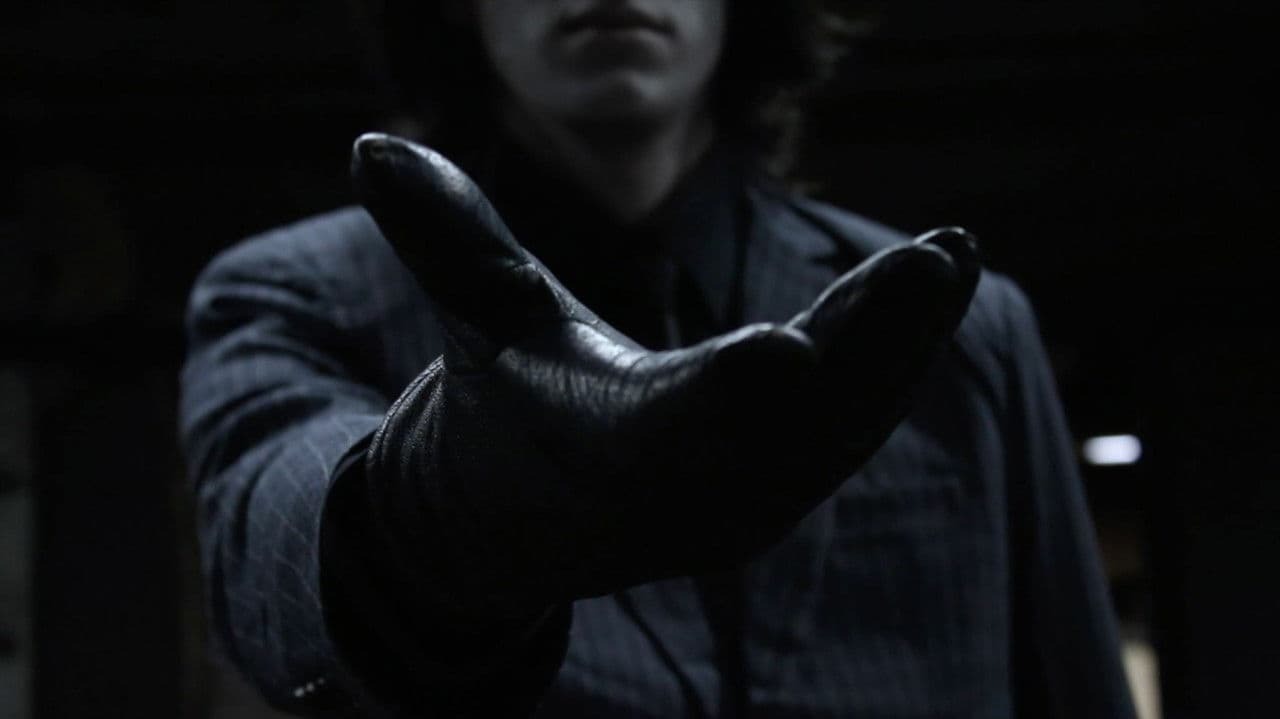 Backdrop – The Man in the Pinstripe Suit