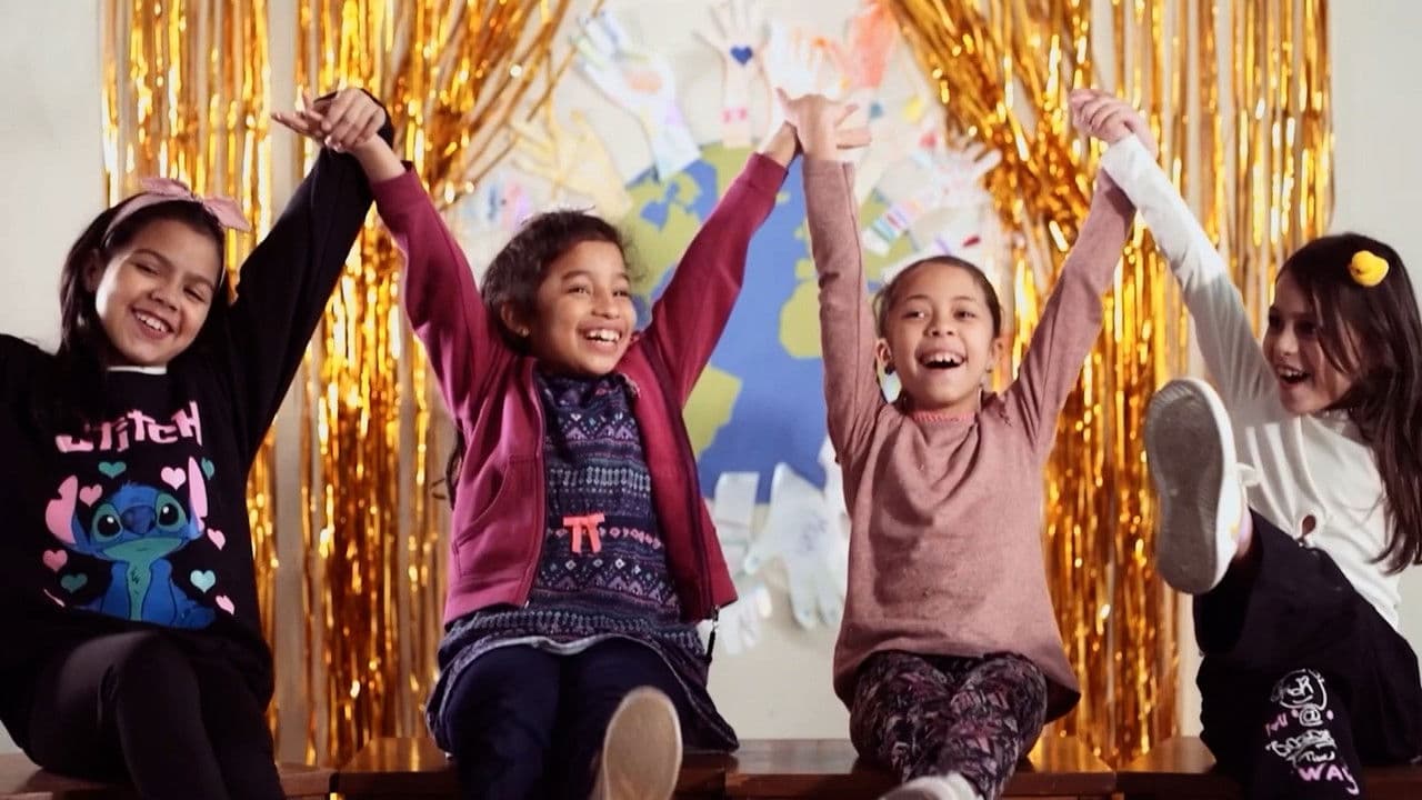 Backdrop – Infancias sin fronteras: voces en movimiento