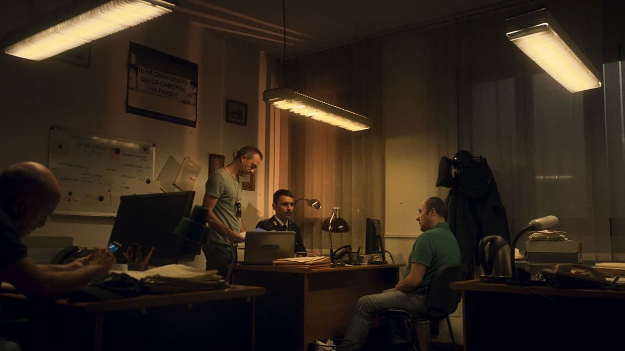 Backdrop – Il barbiere complottista