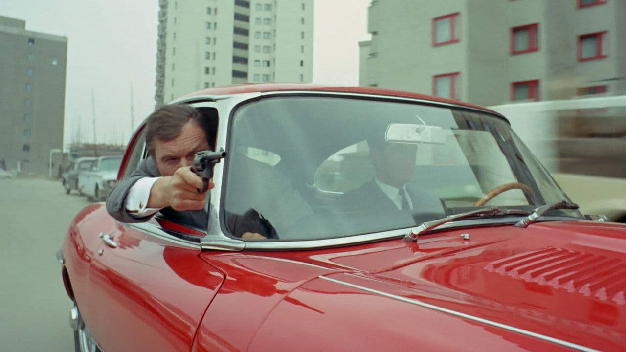 Backdrop – Jerry Cotton - Der Tod im roten Jaguar