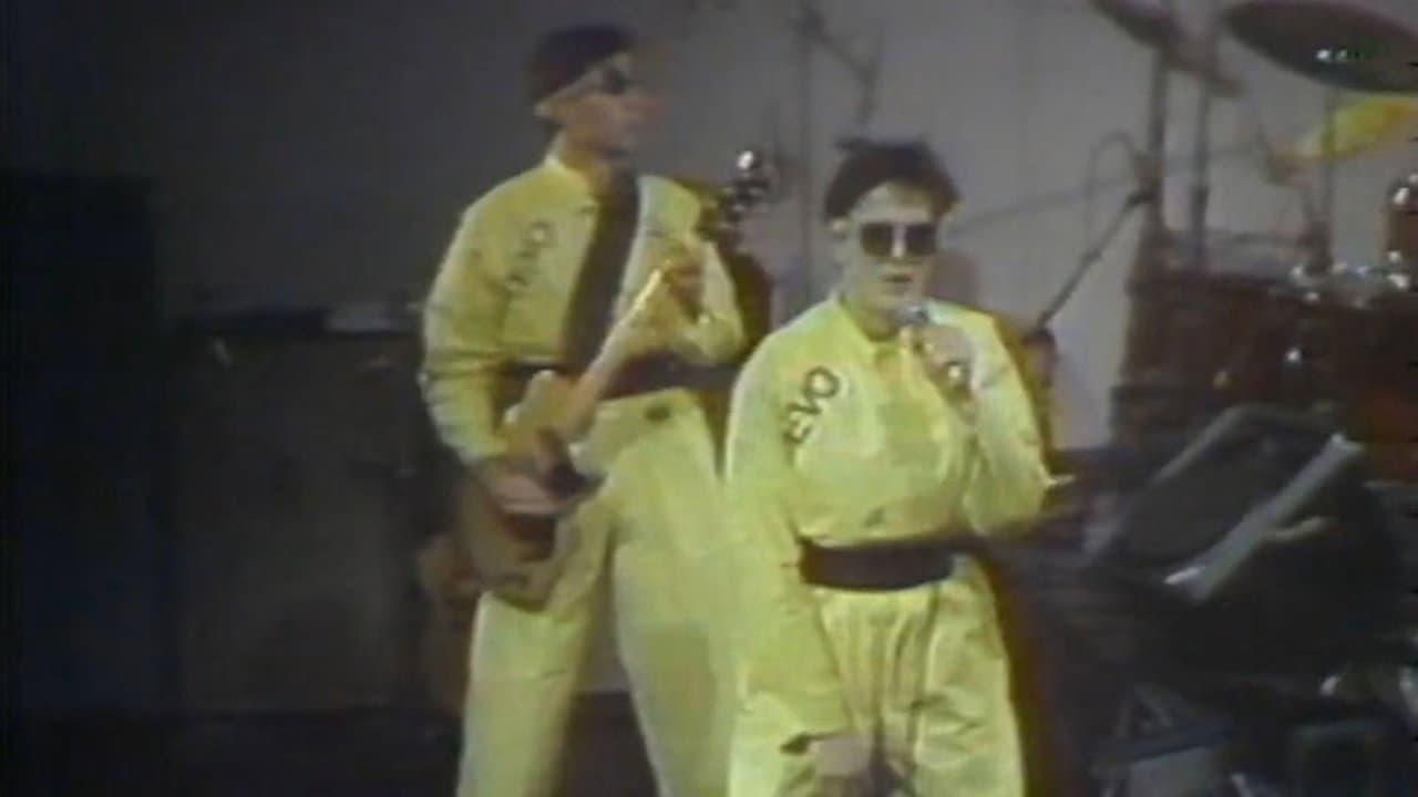Backdrop – DEVO: The Men Who Make the Music