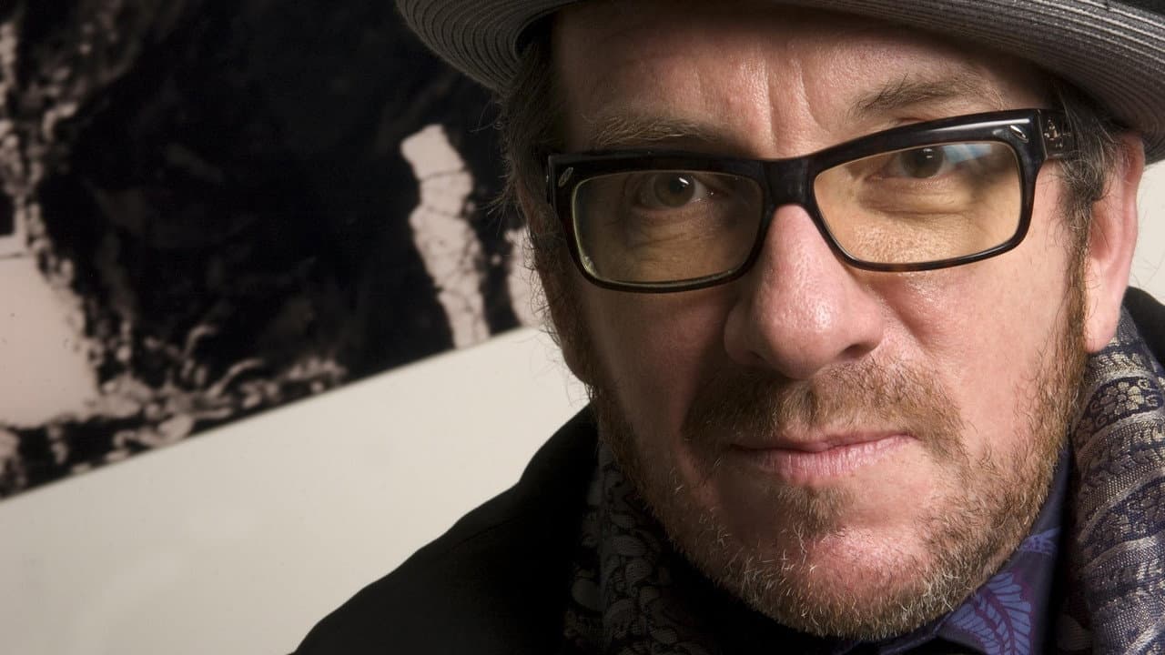 Backdrop – Elvis Costello & The Imposters: The Return Of The Spectacular Spinning Songbook